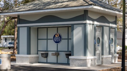 McLean Park in North Myrtle Beach offers a quiet place to walk, relax, and spend time with family just a few blocks from the ocean.
With shaded paths, a playground, picnic shelters, and a peaceful pond, it’s a simple and free way to slow down and enjoy the day along the Grand Strand.